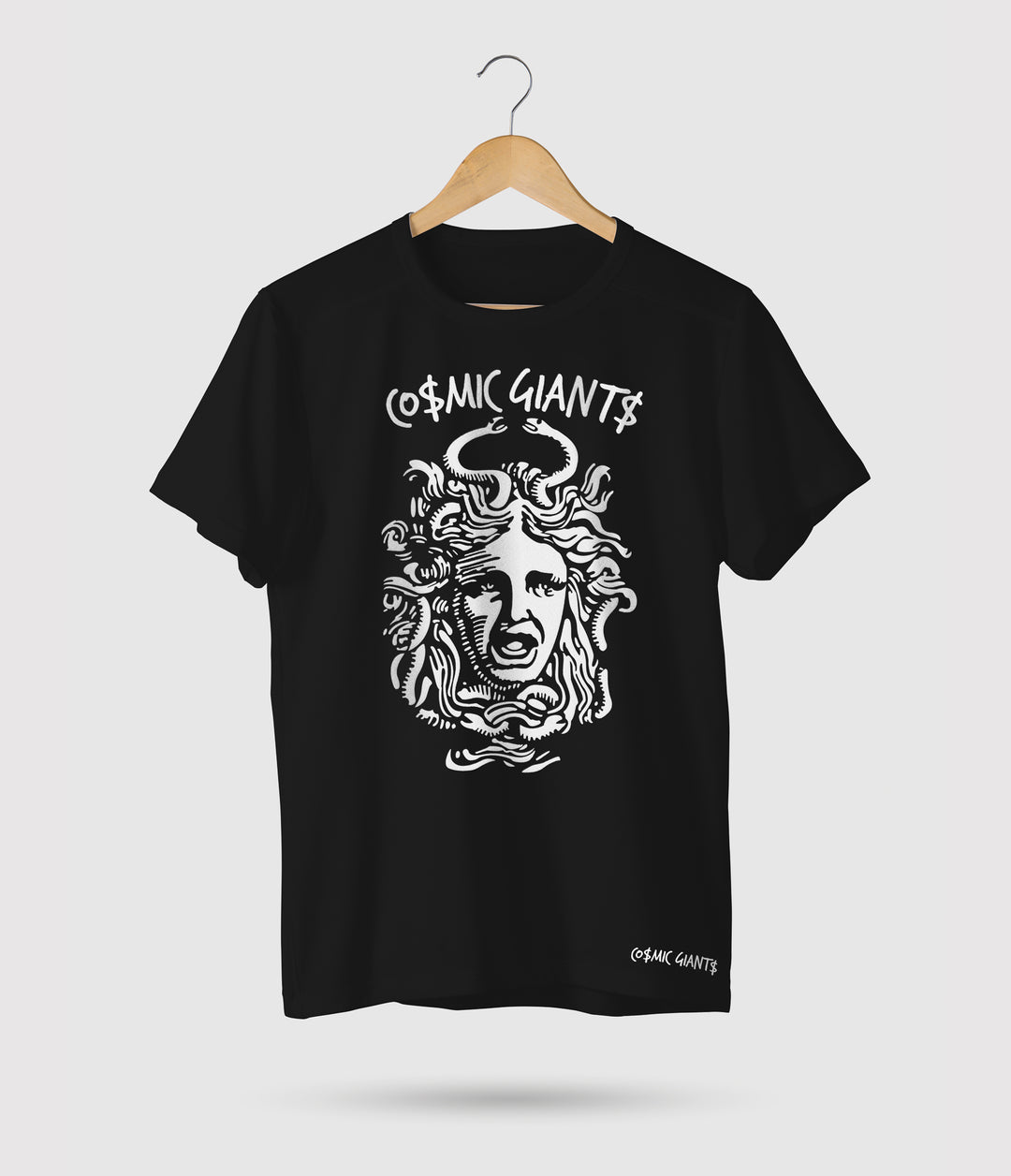 With its striking logo and attention to detail, our Cosmic Giants Medusa T-Shirt captures the essence of our brand's unique aesthetic. Stand out from the crowd and express your individuality with this statement piece. Crafted from 100% cotton. The premium-quality fabric guarantees a soft touch against your skin, while the relaxed fit allows for effortless style and freedom of movement. Machine wash cold tumble dry low. All shirts are made to print.